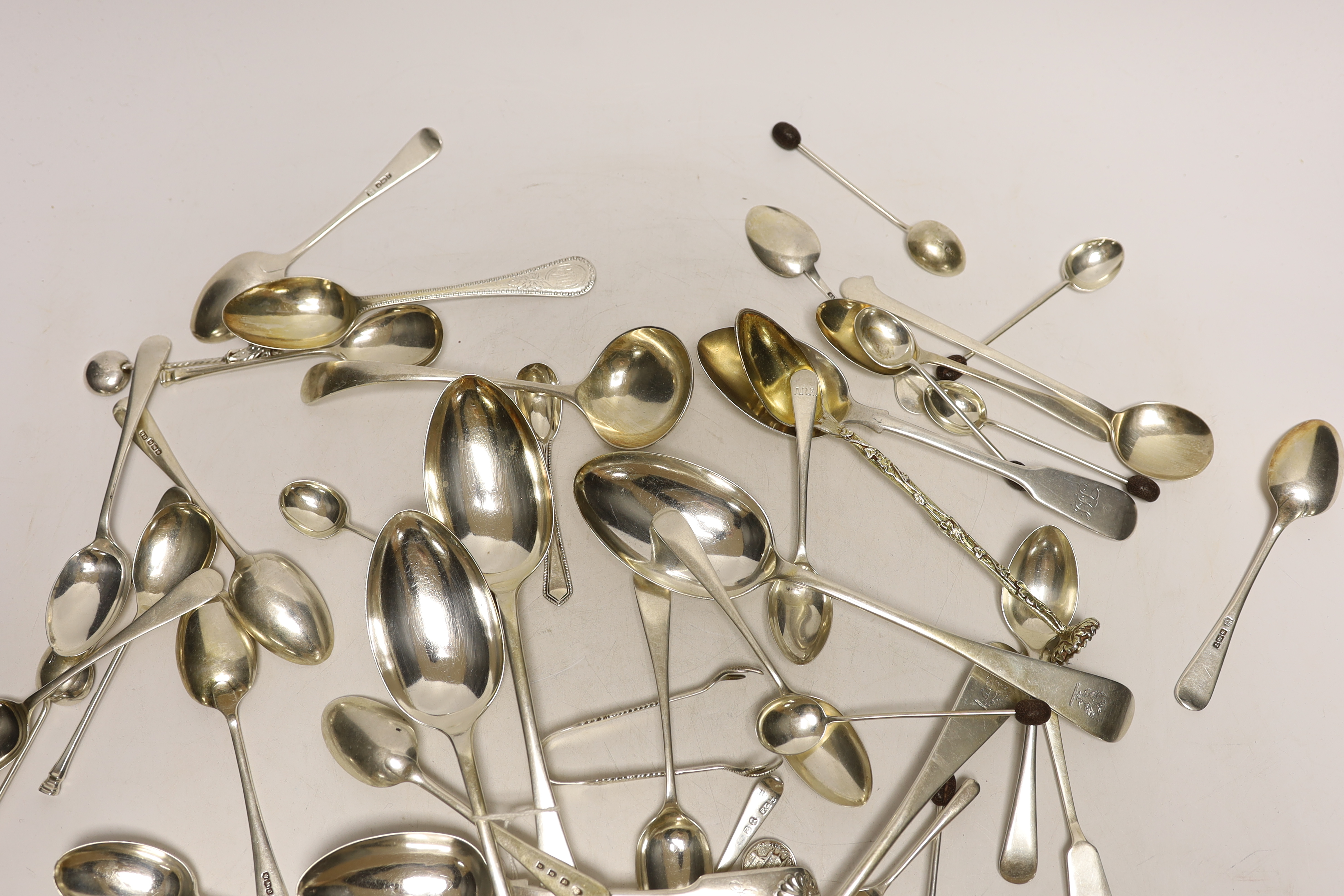 A quantity of assorted mainly silver flatware including teaspoons, table spoons, condiment spoons etc.